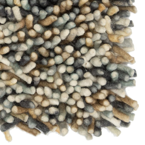 Rinaldo 07 - hoogpolig tapijt in blauw-bruin van Koreman Exclusive Carpets, handgeweven uit wol en katoen.