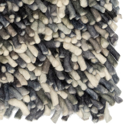 Rinaldo 08 - hoogpolig tapijt in blauw-bruin van Koreman Exclusive Carpets, handgeweven uit wol en katoen.