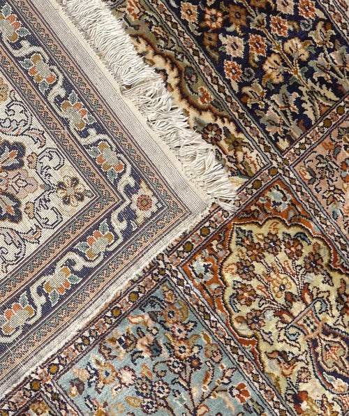 Kashmir Bachtiar 01970 vloerkleed in bruin van Koreman Exclusive Carpets, handgeknoopt uit zijde.