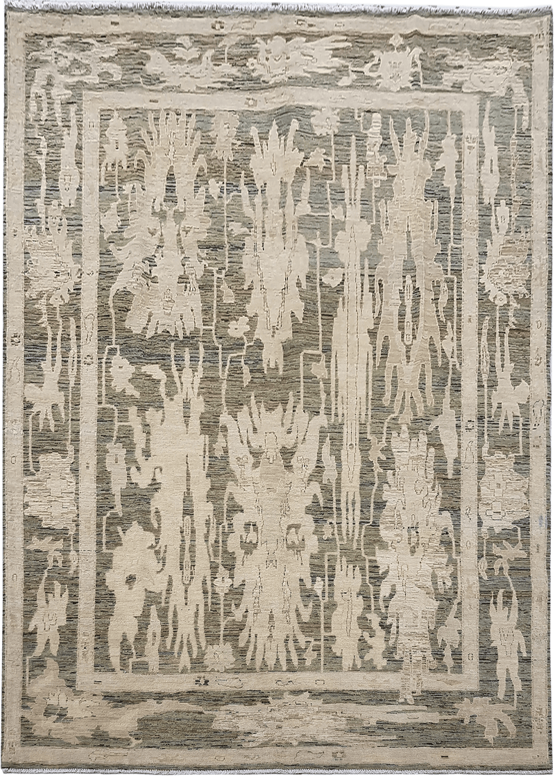 Kashkuli Fields vloerkleed in groen-beige van Koreman Exclusive Carpets, handgeknoopt uit wol.