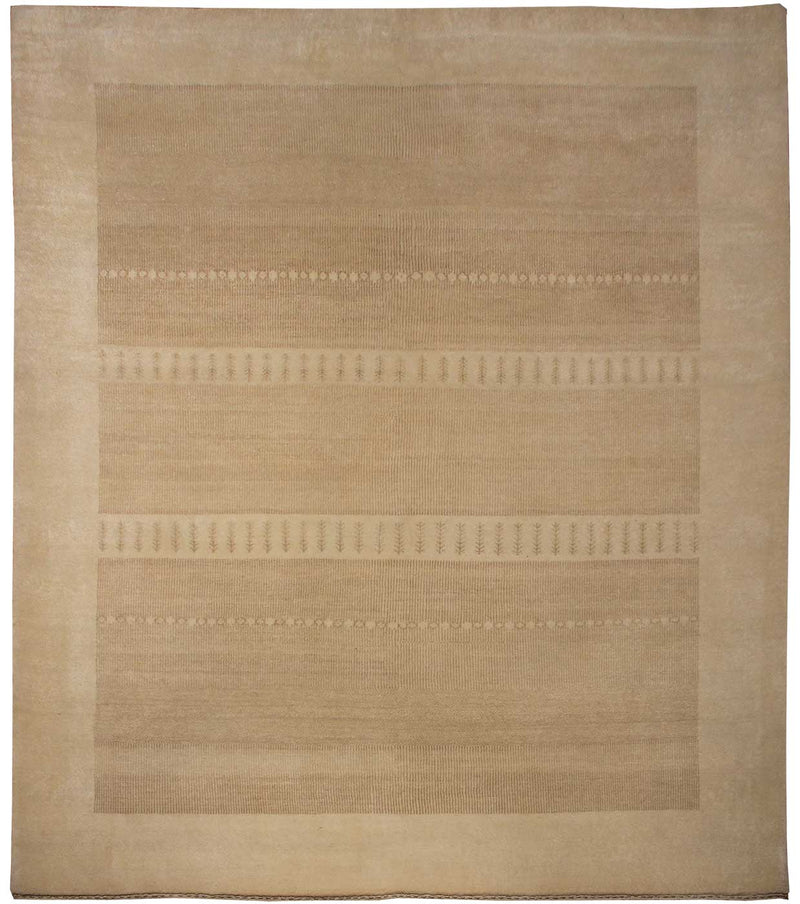 Loribaft tapijt 00033 in beige van Koreman Exclusive Carpets, handgeknoopt uit wol.