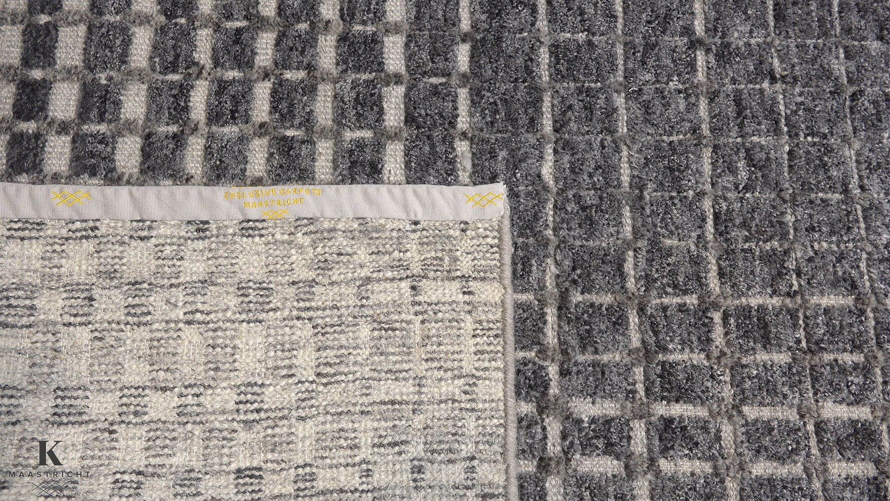 Urban Matrix design tapijt 5263 vloerkleed in antraciet van Koreman Exclusive Carpets, handgeknoopt uit wol.