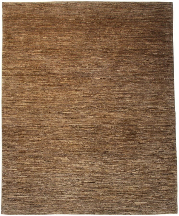 Urban Nature Old Plain Oak vloerkleed in bruin van Koreman Exclusive Carpets, handgeknoopt uit wol.
